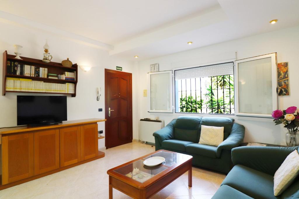 TV a/nebo společenská místnost v ubytování Apartment Zafiro Meneguina by SpainSunRentals 1120