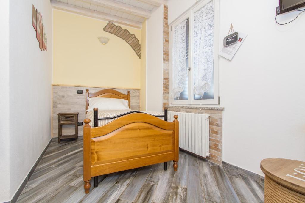 Postel nebo postele na pokoji v ubytování Le Camere Di Aladino