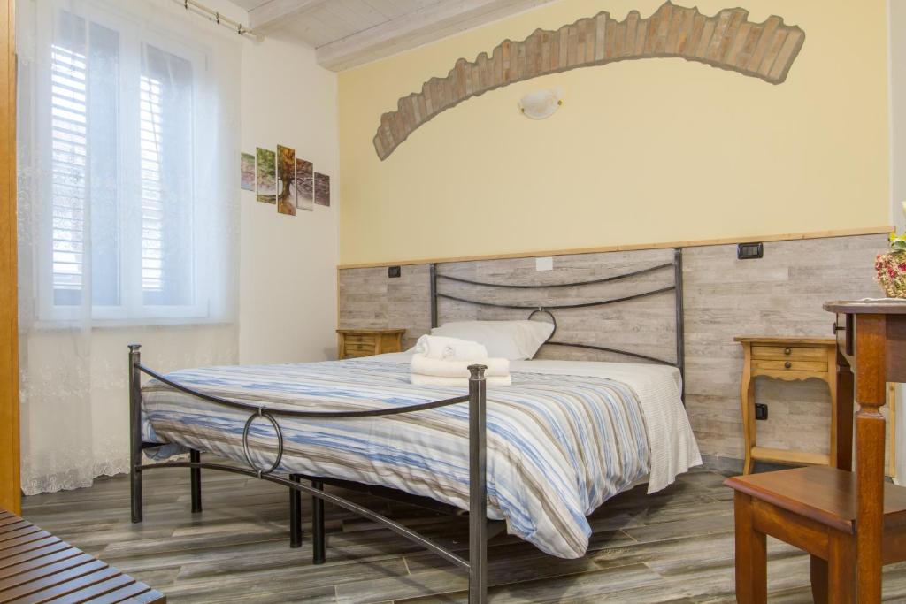 Postel nebo postele na pokoji v ubytování Le Camere Di Aladino