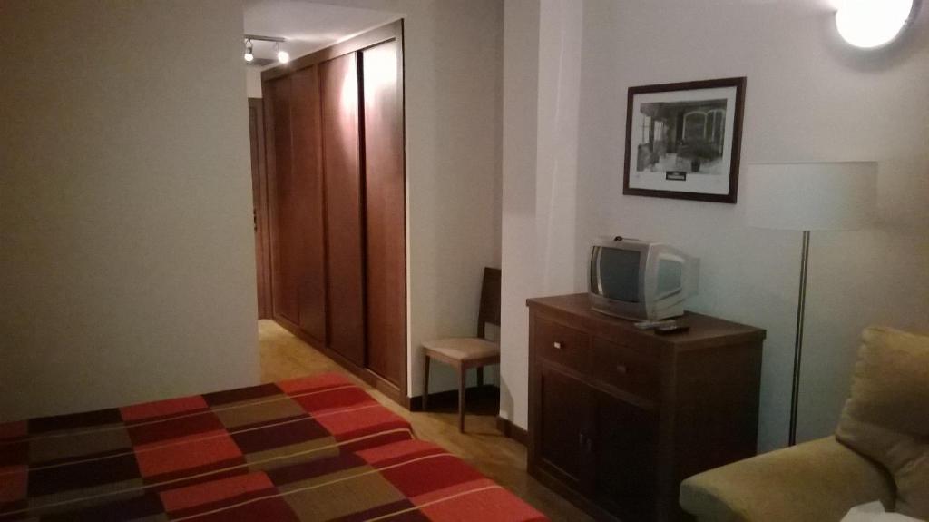 Posteľ alebo postele v izbe v ubytovaní Hostal Patrón