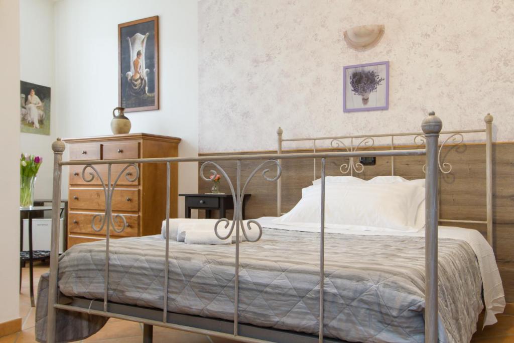 Postel nebo postele na pokoji v ubytování Le Camere Di Aladino