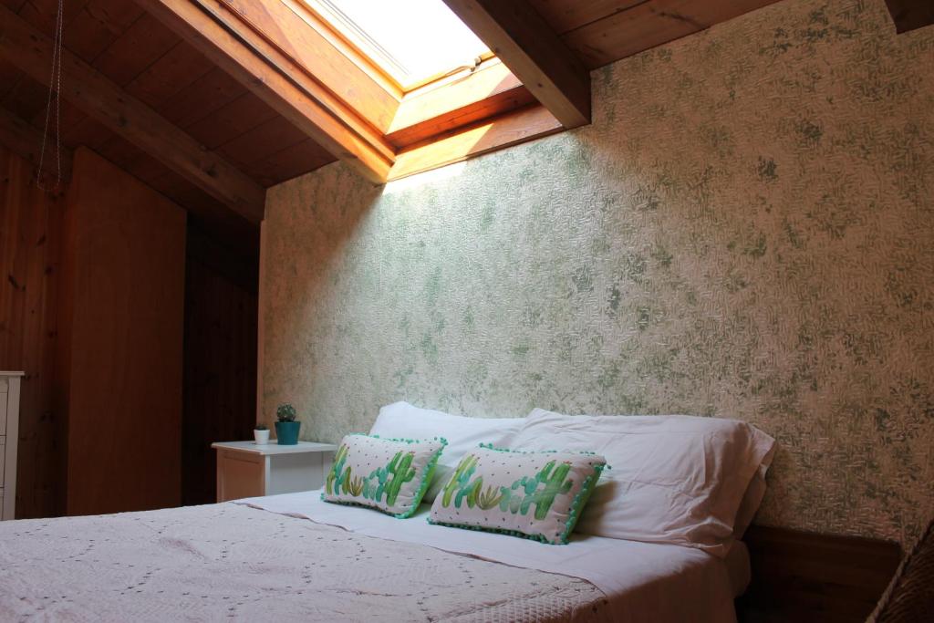 Postel nebo postele na pokoji v ubytování Le Camere Di Aladino