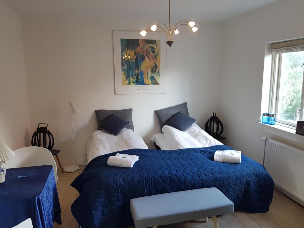 Postel nebo postele na pokoji v ubytování Koege Guesthouse