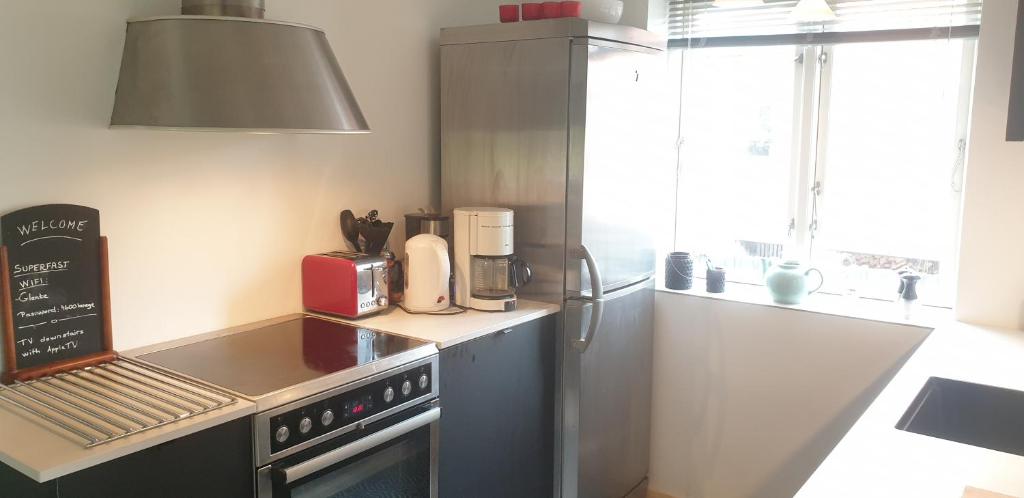 Kuchyň nebo kuchyňský kout v ubytování Koege Guesthouse