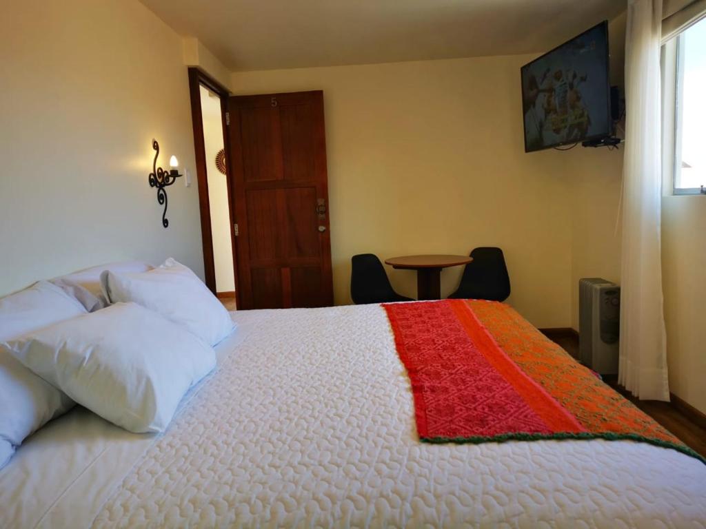 Postel nebo postele na pokoji v ubytování Casa Durand