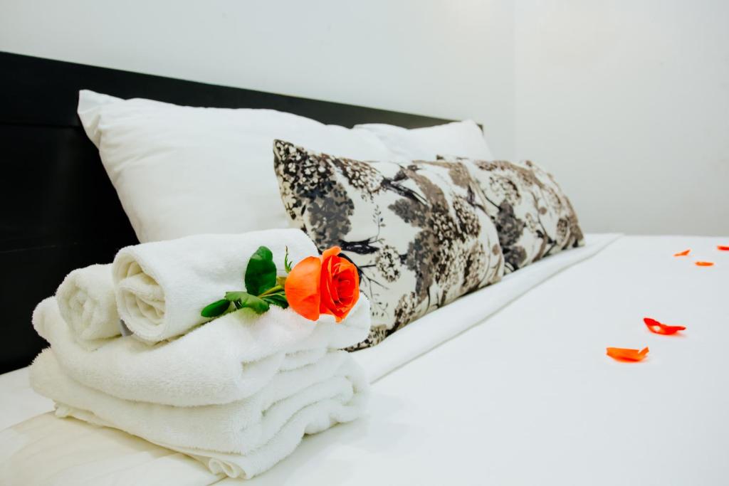 Postel nebo postele na pokoji v ubytování Hoianation Villas Hotel