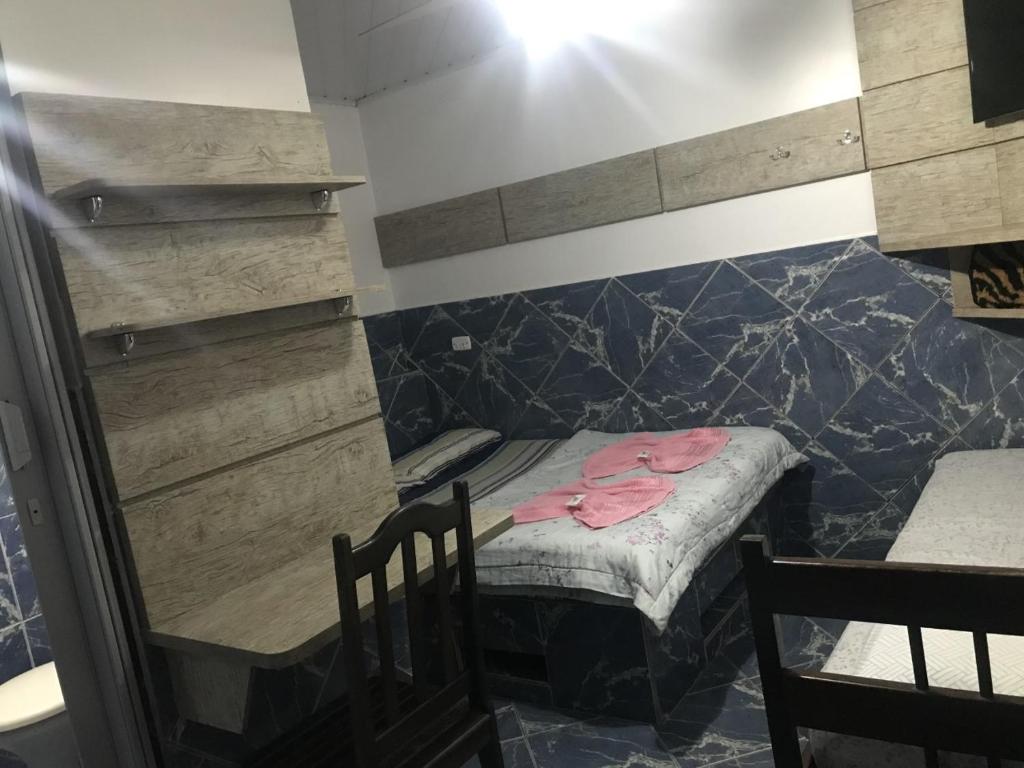 Postel nebo postele na pokoji v ubytování Piemont Hotel