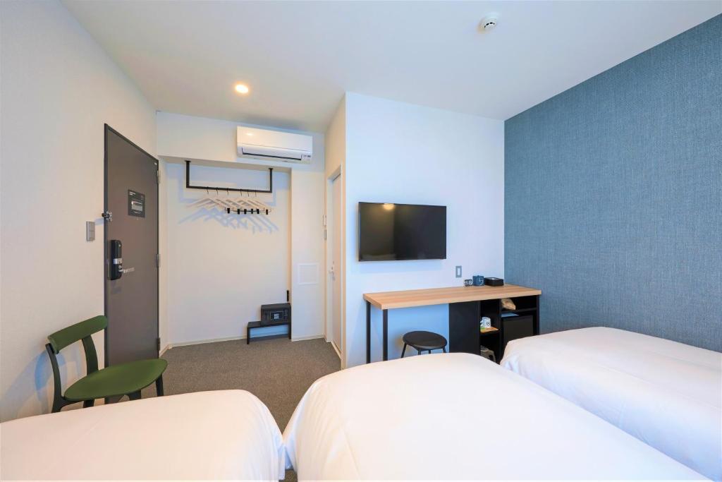 TV a/nebo společenská místnost v ubytování M's Hotel Sanjo Omiya