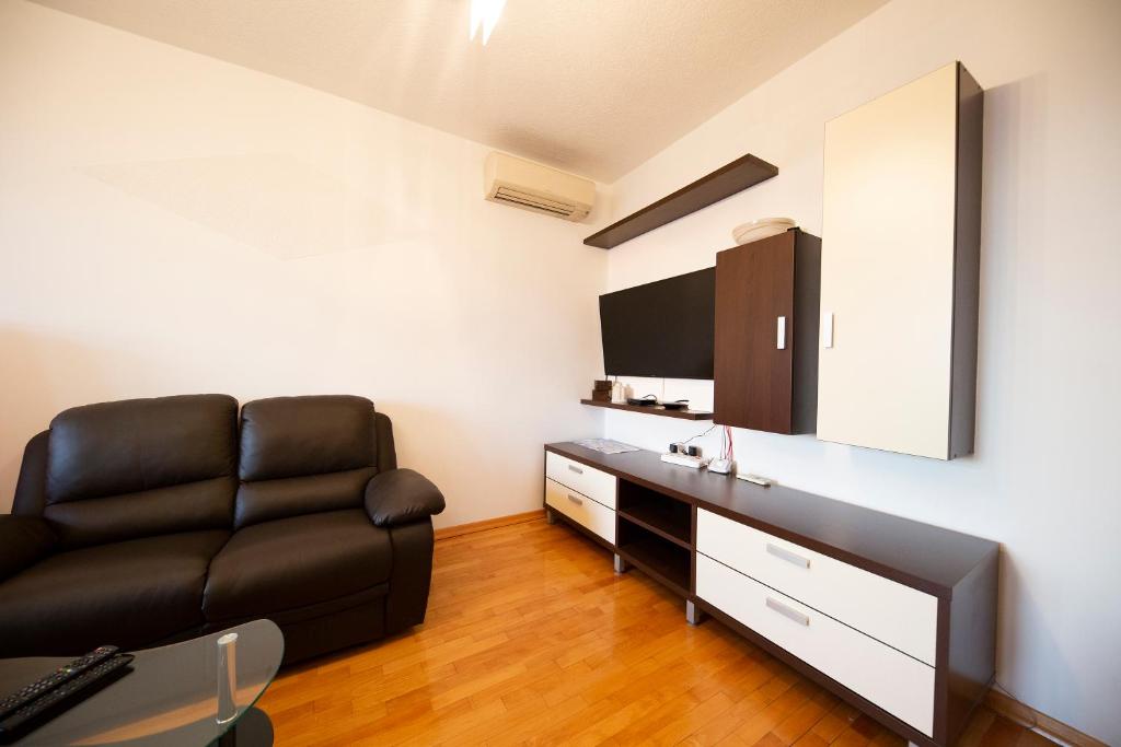 Televízia a/alebo spoločenská miestnosť v ubytovaní City&Sea view 2BR 4+2