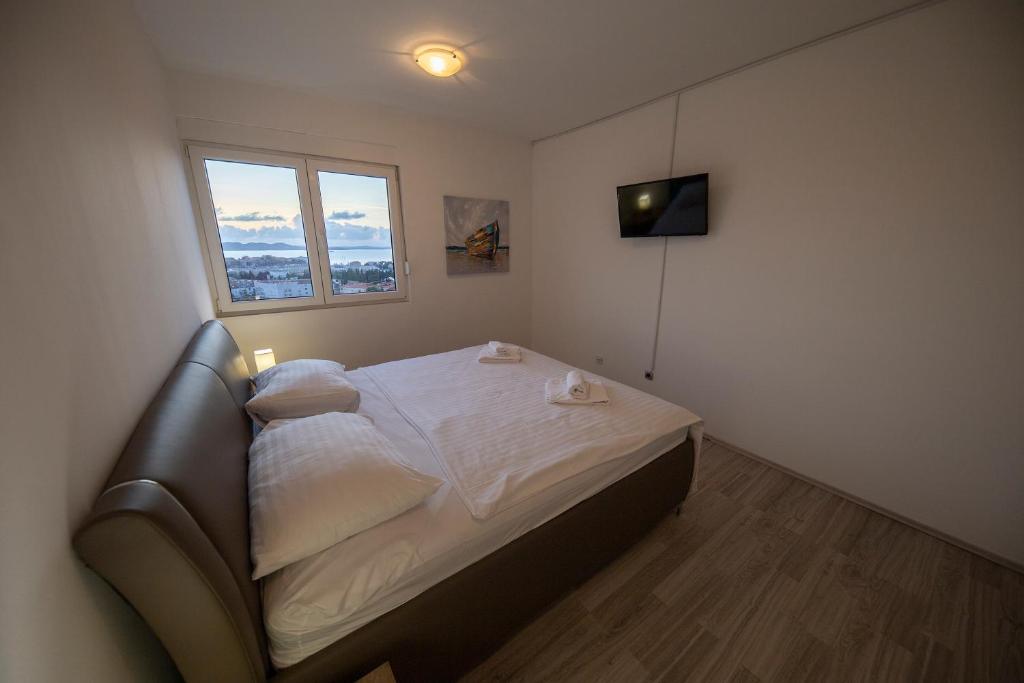 Posteľ alebo postele v izbe v ubytovaní City&Sea view 2BR 4+2