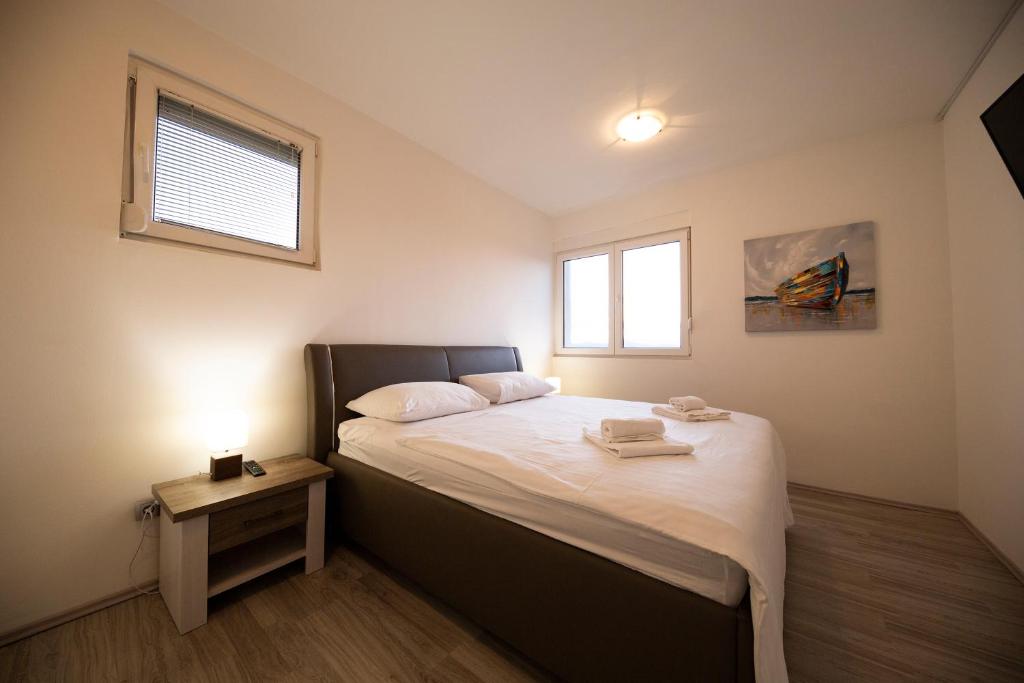 Posteľ alebo postele v izbe v ubytovaní City&Sea view 2BR 4+2