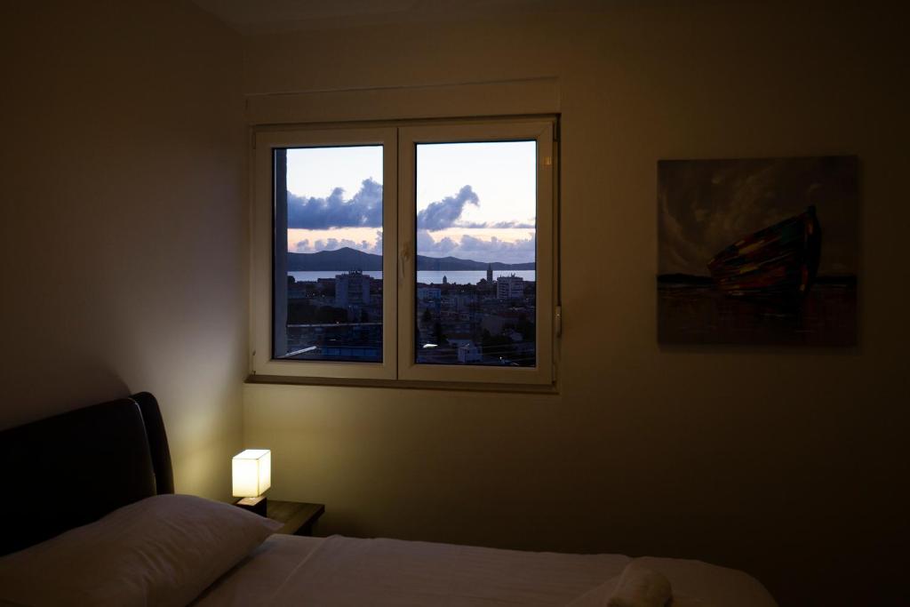 Posteľ alebo postele v izbe v ubytovaní City&Sea view 2BR 4+2