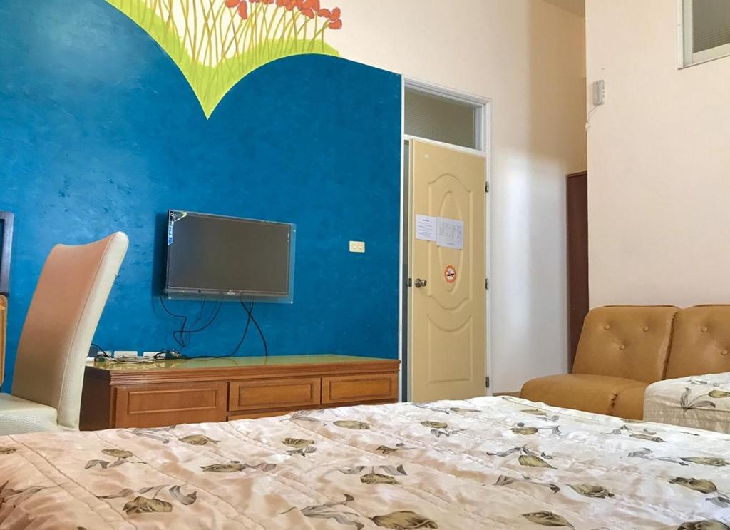 Postel nebo postele na pokoji v ubytování Fu Yuan B&B