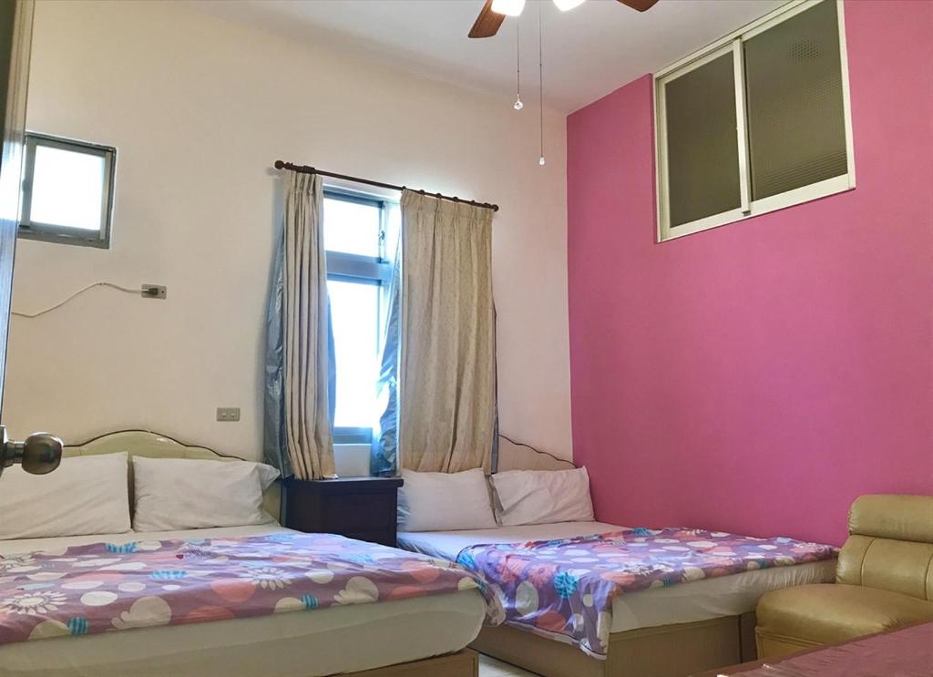 Postel nebo postele na pokoji v ubytování Fu Yuan B&B