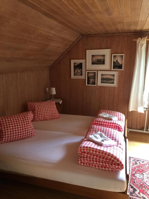 Postel nebo postele na pokoji v ubytování Gästehaus Schäfli