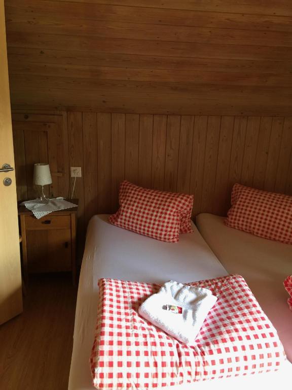 Postel nebo postele na pokoji v ubytování Gästehaus Schäfli