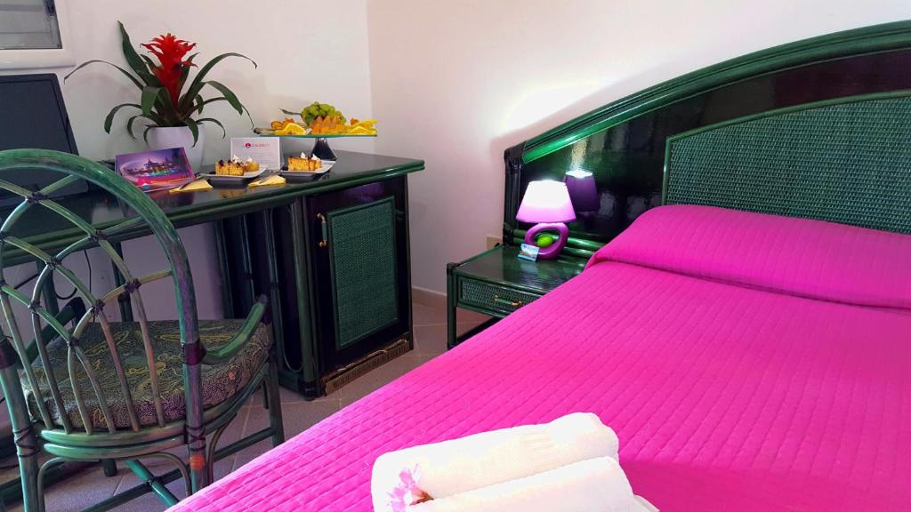 Postel nebo postele na pokoji v ubytování Hotel Villaggio Stromboli