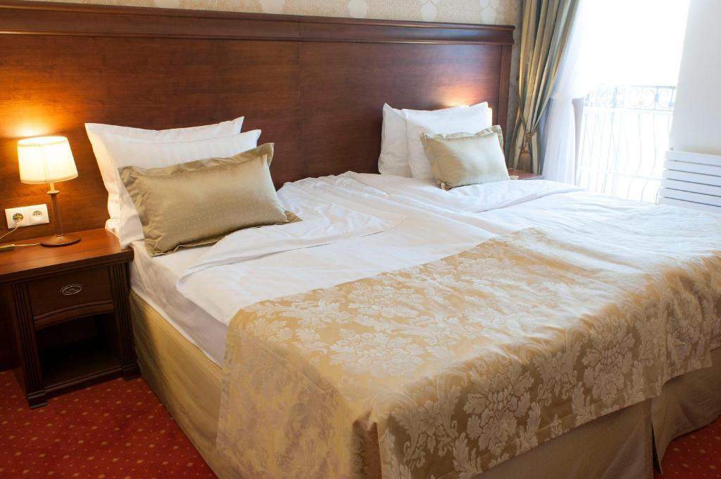 Postel nebo postele na pokoji v ubytování Hotel Splendor