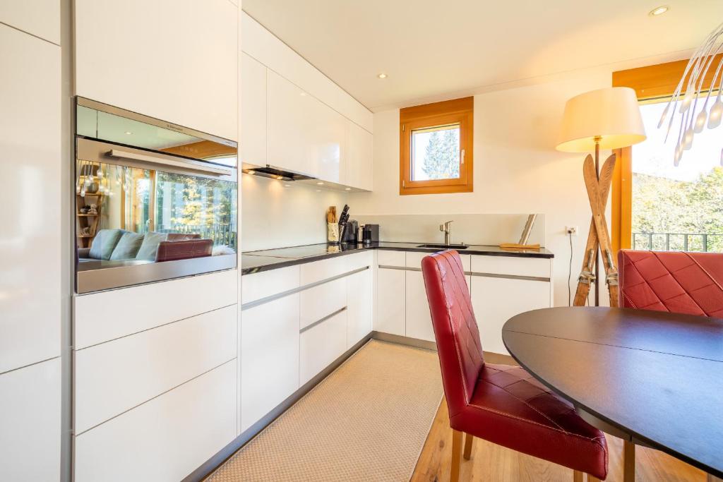 Kuchyň nebo kuchyňský kout v ubytování LAAX Homes - Taviarna Laax 3,6
