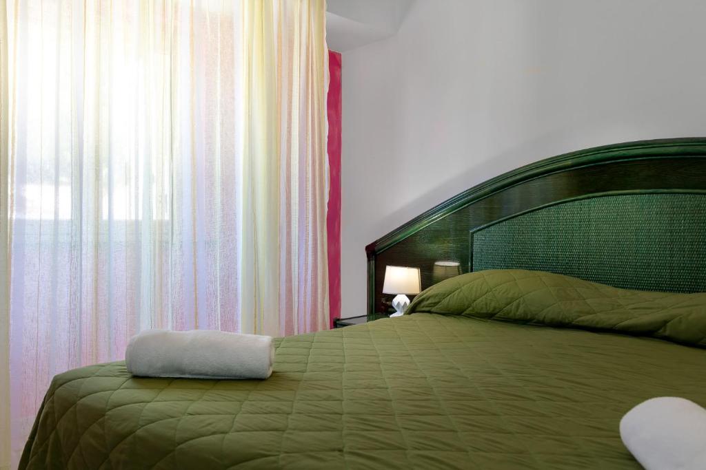 Postel nebo postele na pokoji v ubytování Hotel Villaggio Stromboli