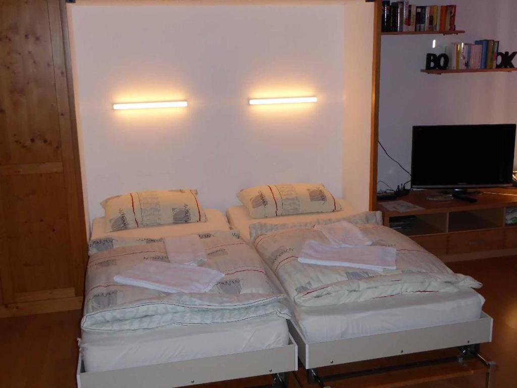 Postel nebo postele na pokoji v ubytování Appartement am Waldeck