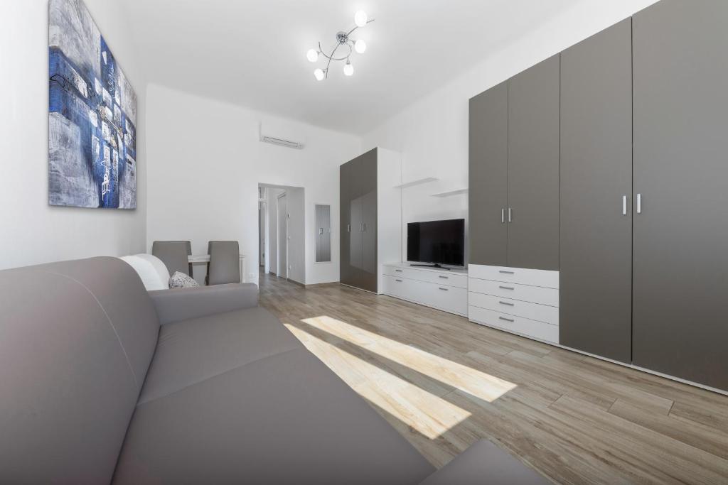 Telewizja i/lub zestaw kina domowego w obiekcie Casa da Suite Hora