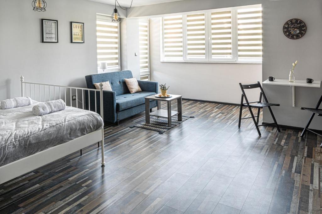 Postel nebo postele na pokoji v ubytování Gladstone suites