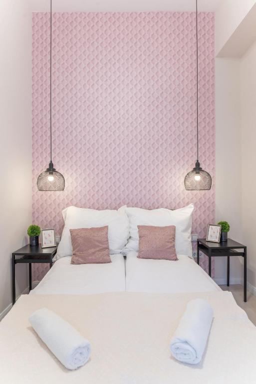 Posteľ alebo postele v izbe v ubytovaní Milano Design Apartment City Center with AC