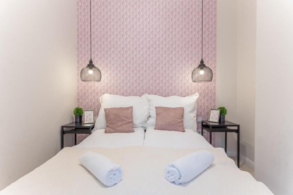 Posteľ alebo postele v izbe v ubytovaní Milano Design Apartment City Center with AC