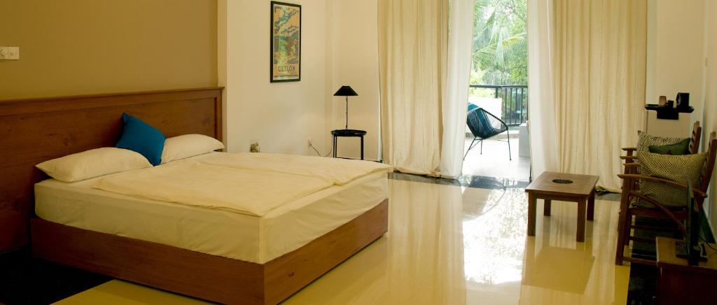 Photo de la galerie de l'établissement villa layanga - riverside guestrooms, à Aluthgama