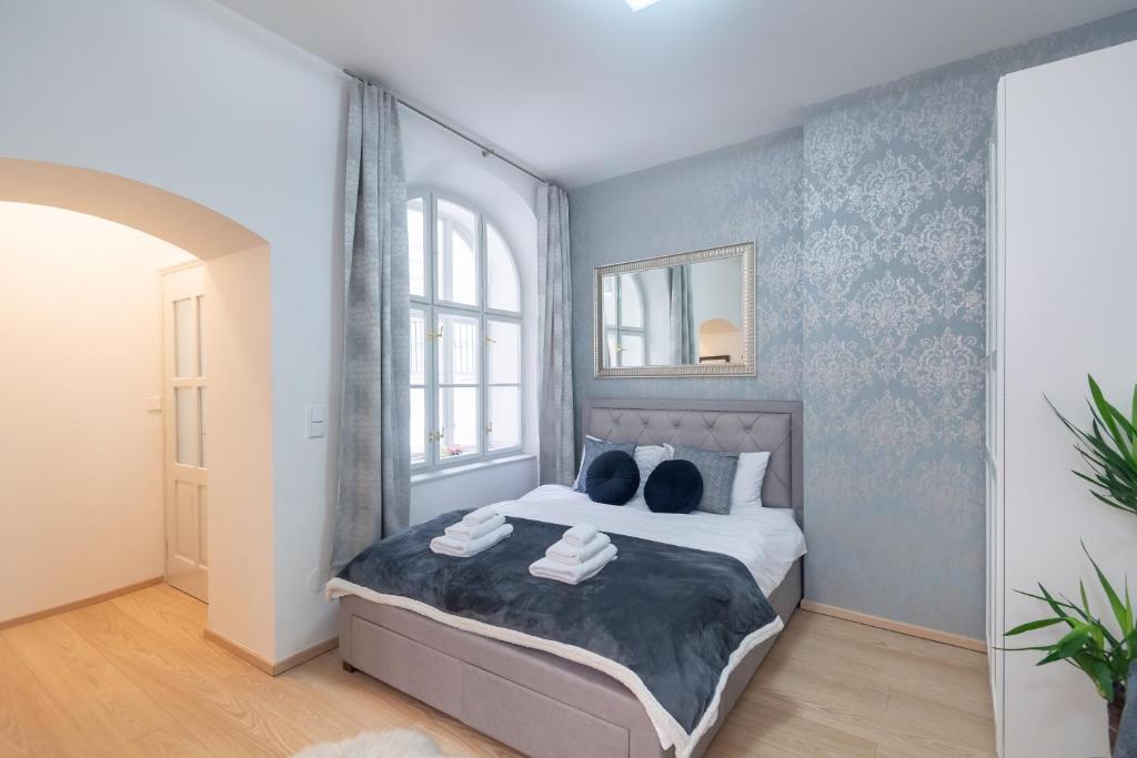 Ένα ή περισσότερα κρεβάτια σε δωμάτιο στο Quiet apartment in the heart of Old Town centre