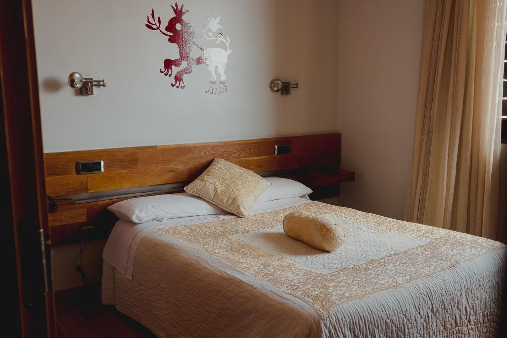 Cama o camas de una habitación en Posada Miranda