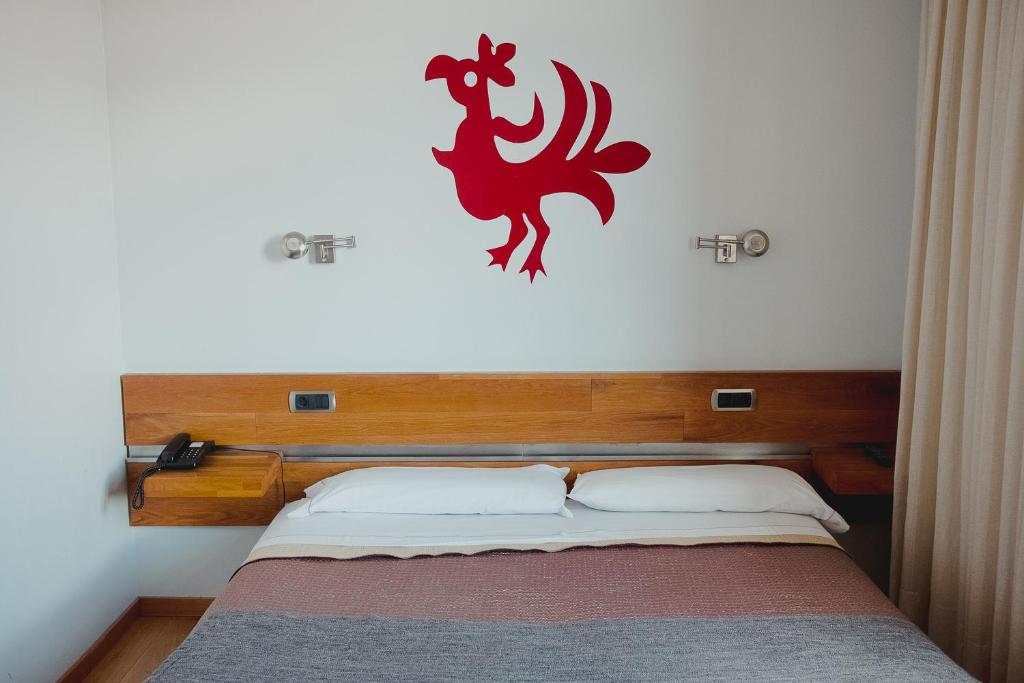 Cama o camas de una habitación en Posada Miranda