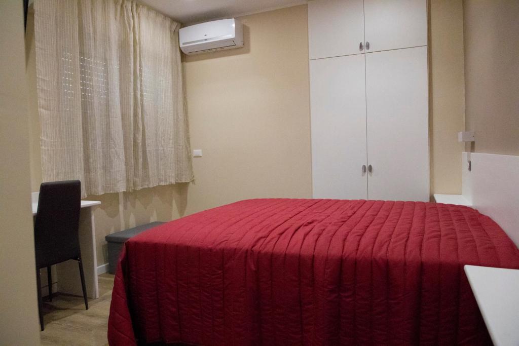 Postel nebo postele na pokoji v ubytování Tre Fontane
