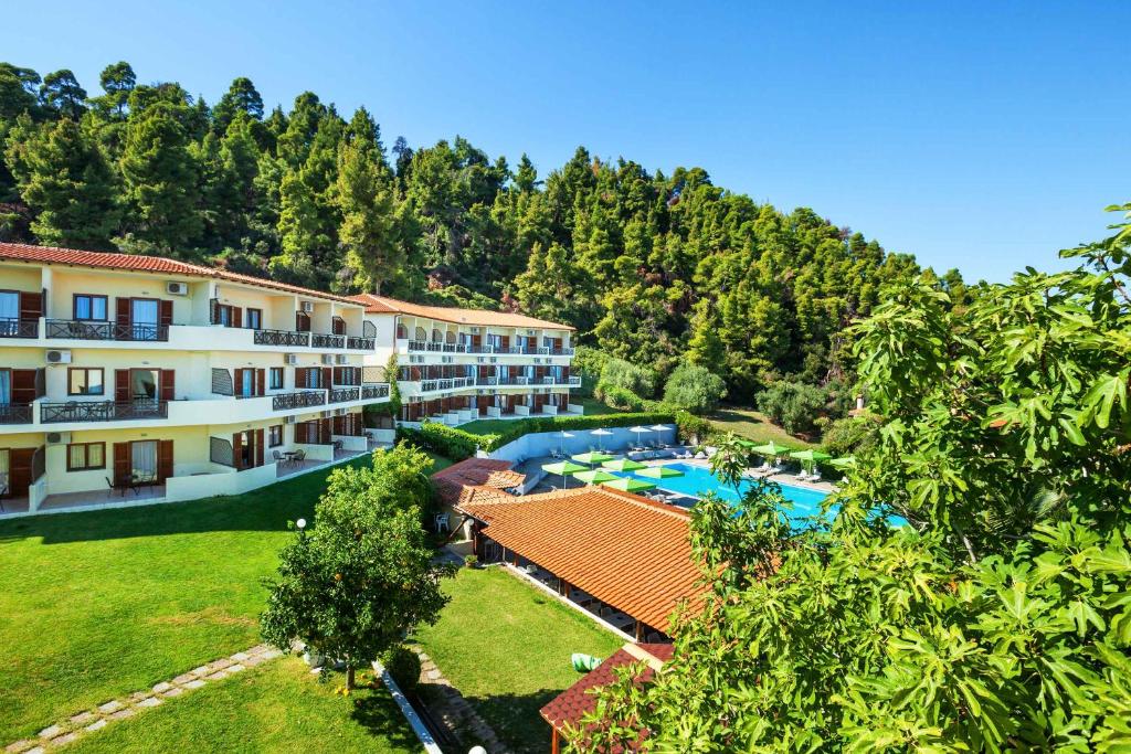 an aerial view of a resort with a swimming pool at Palladium Hotel in Kriopigi