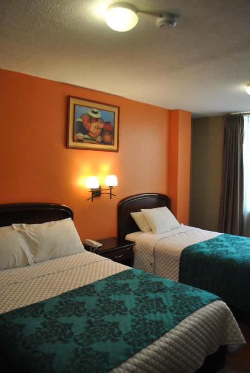 Postel nebo postele na pokoji v ubytování Hotel Makroz