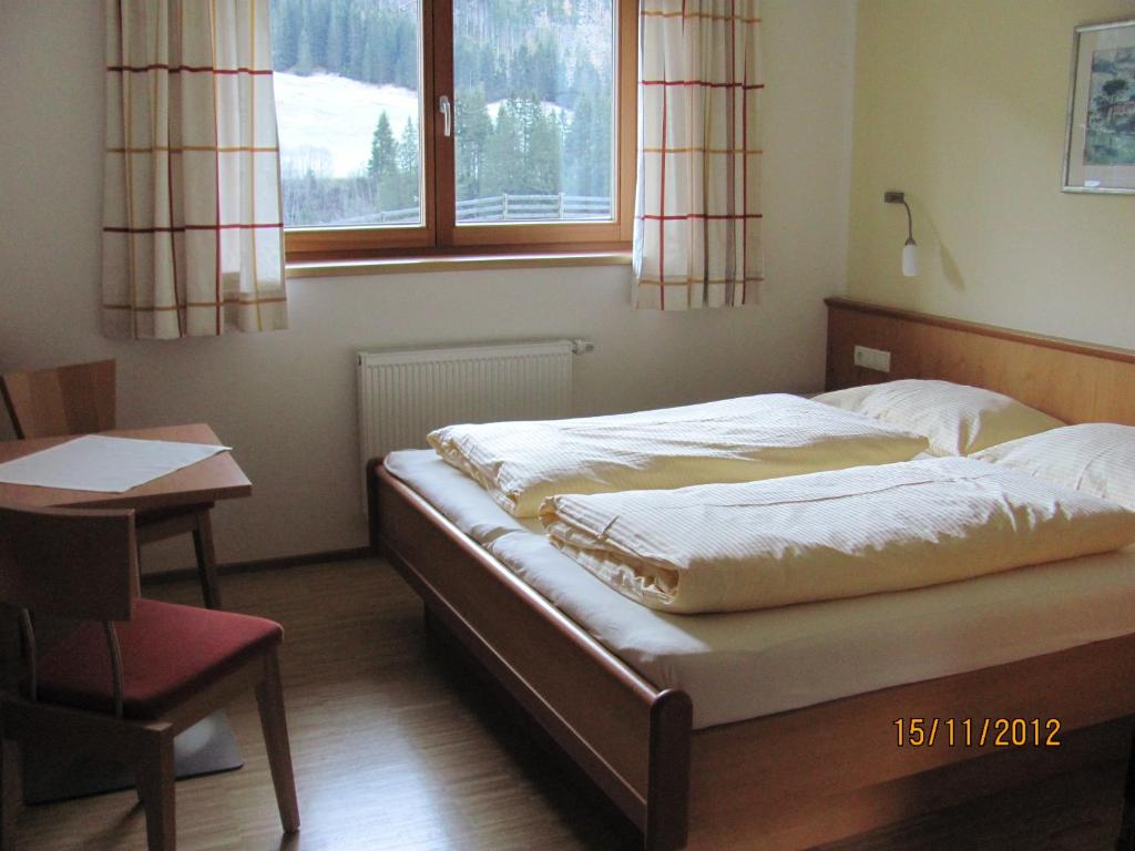 Postel nebo postele na pokoji v ubytování An der Mühle