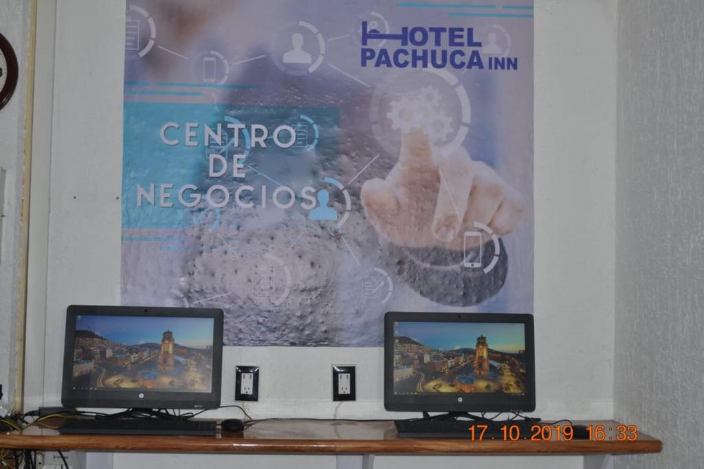 TV a/nebo společenská místnost v ubytování Hotel Pachuca Inn