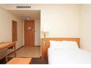 Postel nebo postele na pokoji v ubytování Smile Hotel Nara