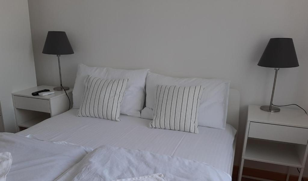 Postel nebo postele na pokoji v ubytování Vrnjci House