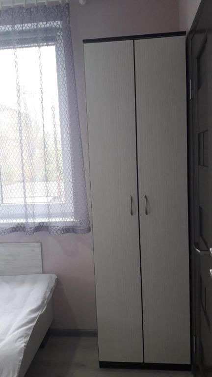 Voodi või voodid majutusasutuse Guest House MAX toas