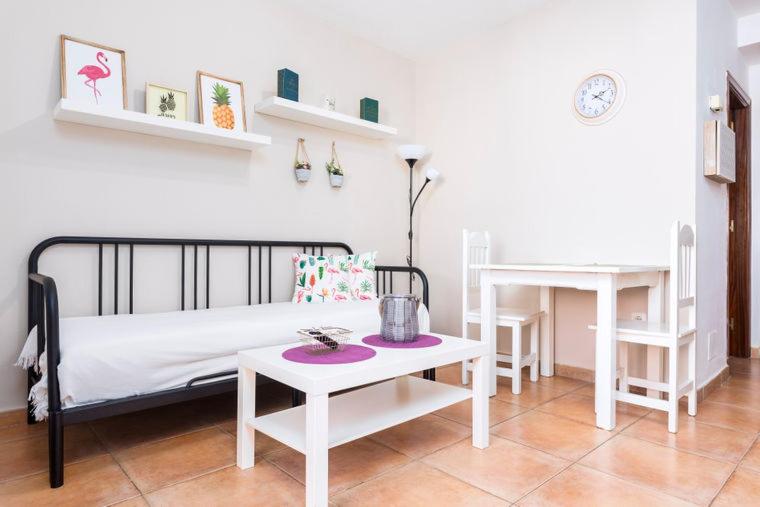 A bed or beds in a room at Apartamento Céntrico Lobos