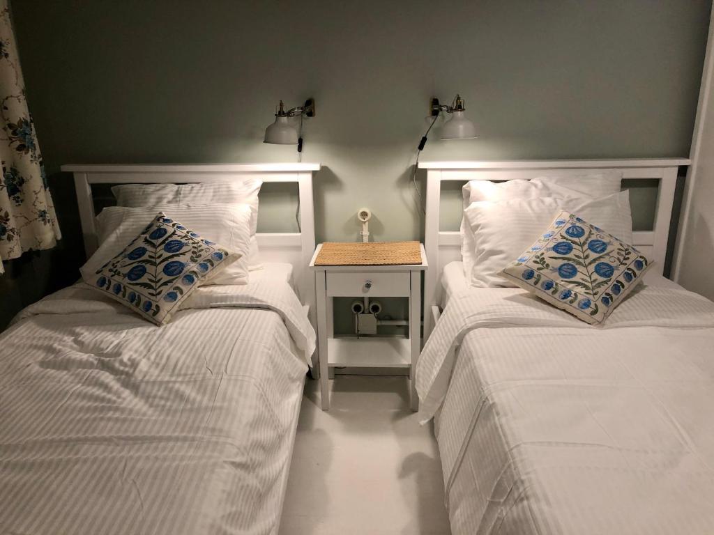 A bed or beds in a room at Mehmet Bey Suites
