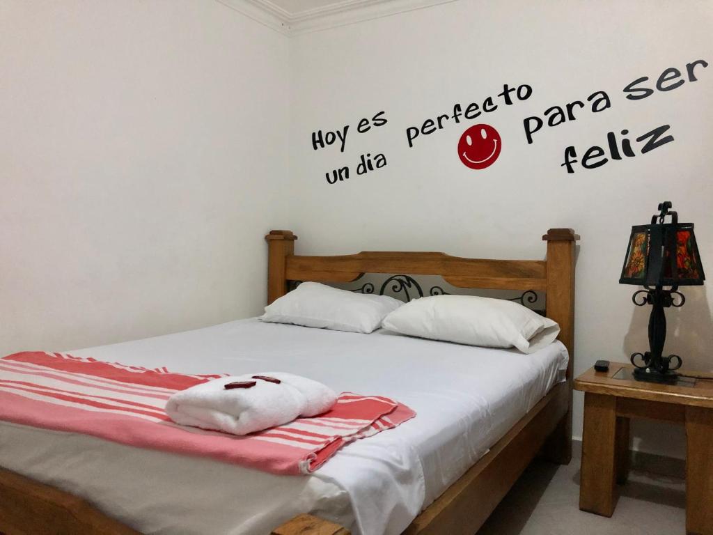 Postel nebo postele na pokoji v ubytování Hotel Casa Malibú