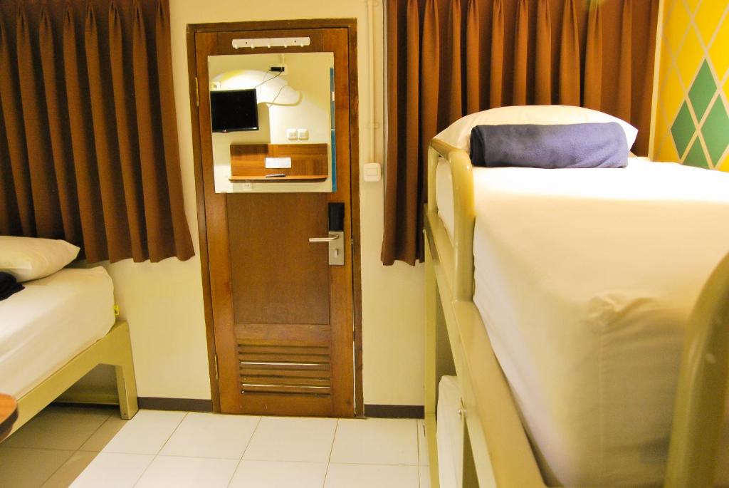 Postel nebo postele na pokoji v ubytování Subwow Hostel