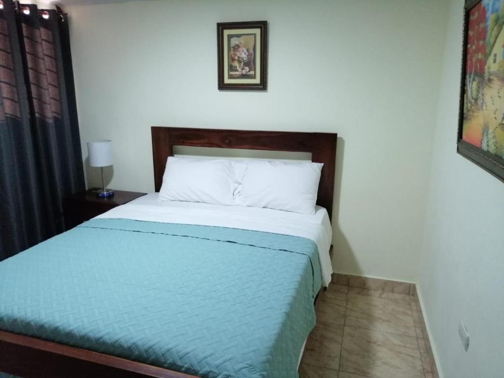 Postel nebo postele na pokoji v ubytování Hotel Anedi