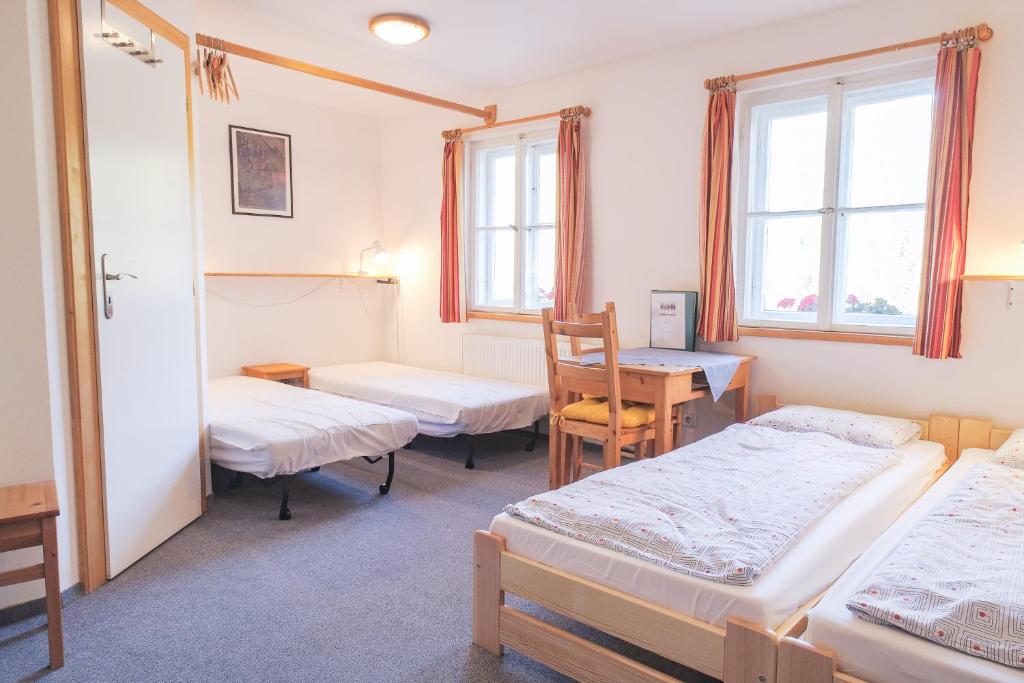 Postel nebo postele na pokoji v ubytování Penzion Lyžec