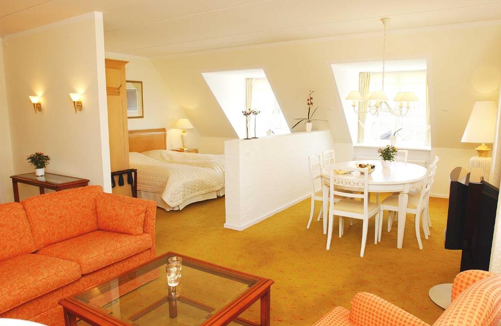 Posezení v ubytování Hotel Knudsens Gaard