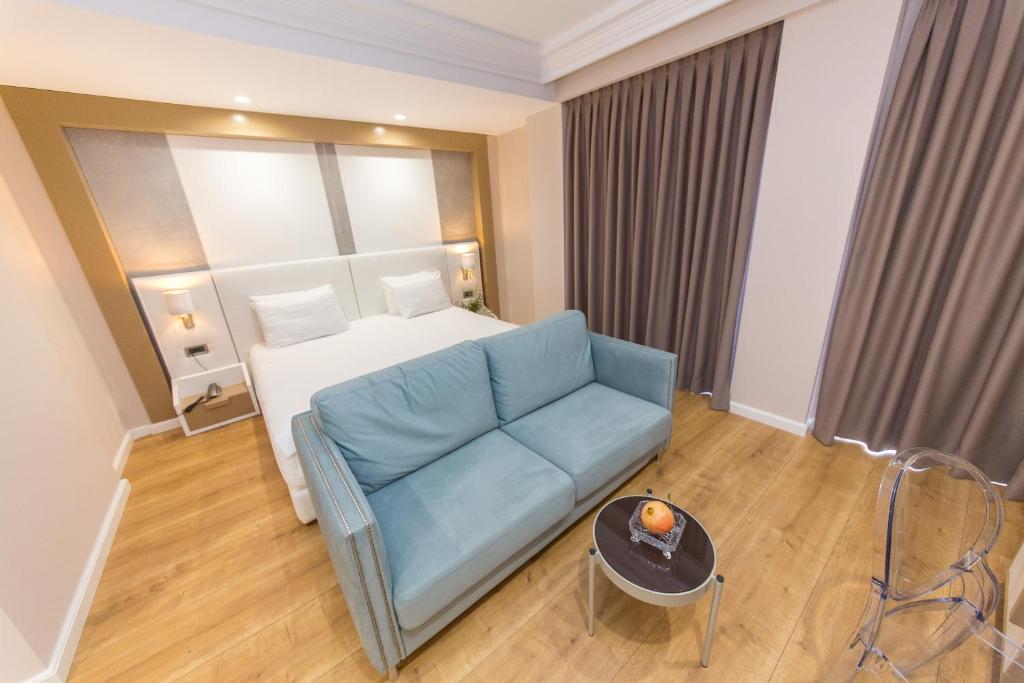 Postel nebo postele na pokoji v ubytování Hotel Brilant Saranda