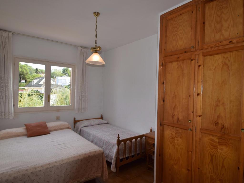 Posteľ alebo postele v izbe v ubytovaní Voramar CostaBravaSi
